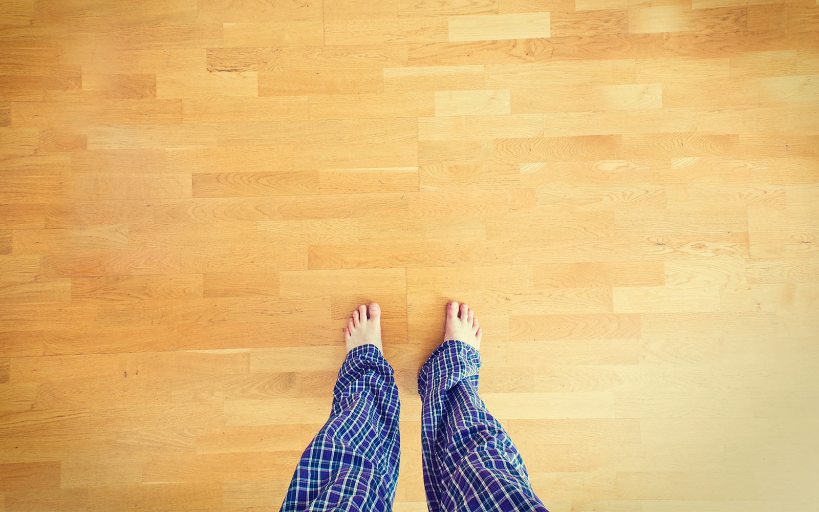 Underfloor blown insulation under a suspended floor